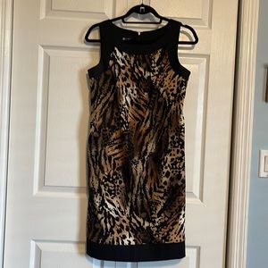 Elegant shift style knee length dress.